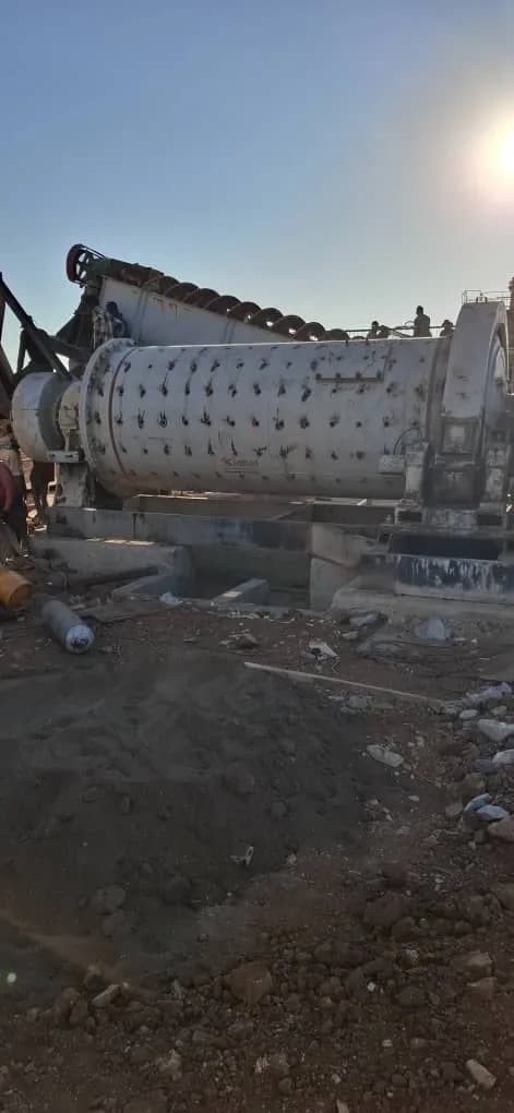 Ball mill positioned on its foundation at sunset