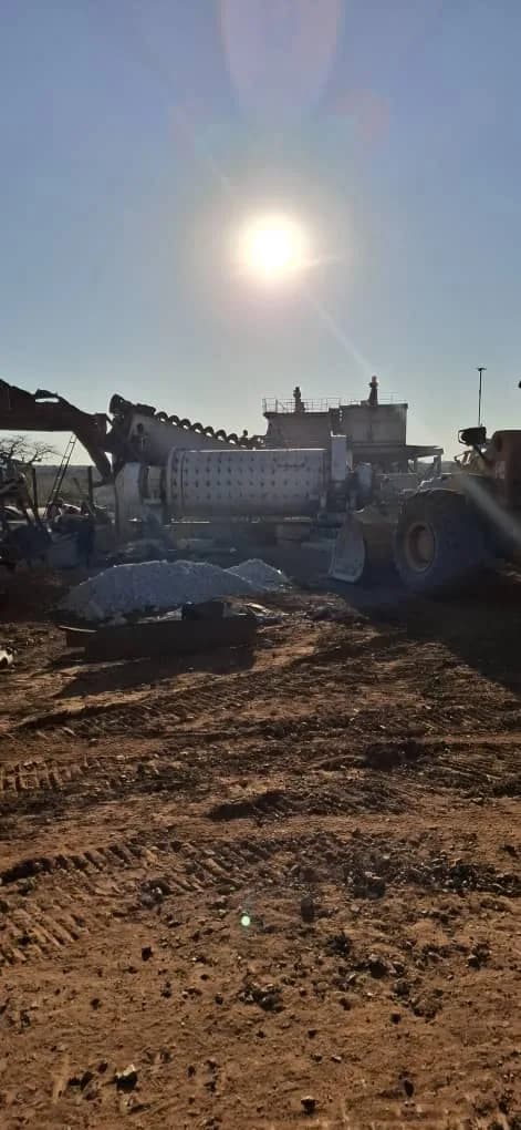 Ball mill with a wheel loader on site