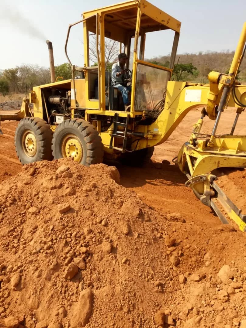 Grader front view during embankment shaping