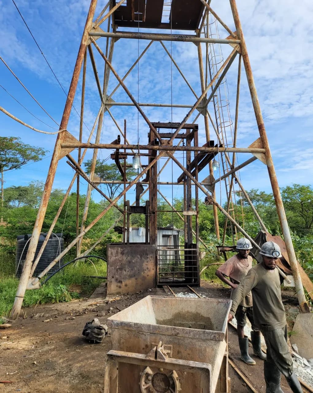 Ore cart beneath the shaft headframe