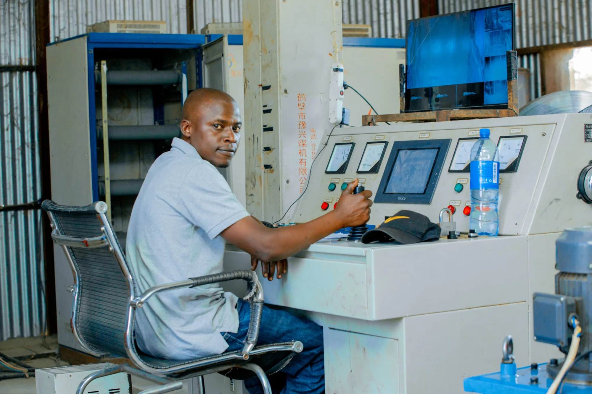 Shaft hoist operator at the control panel